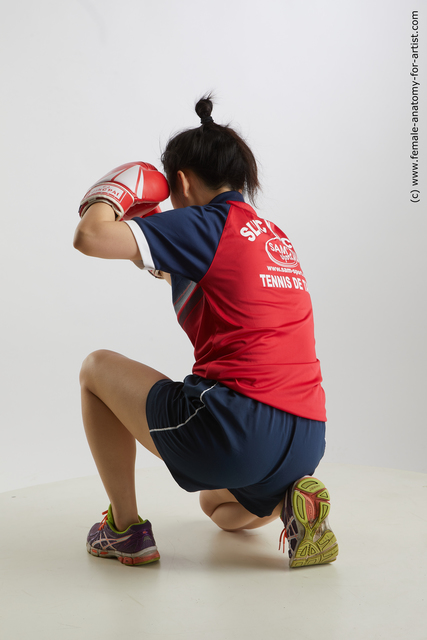 Sportswear Woman Asian Kneeling poses - ALL Average Kneeling poses - on one knee medium black Standard Photoshoot