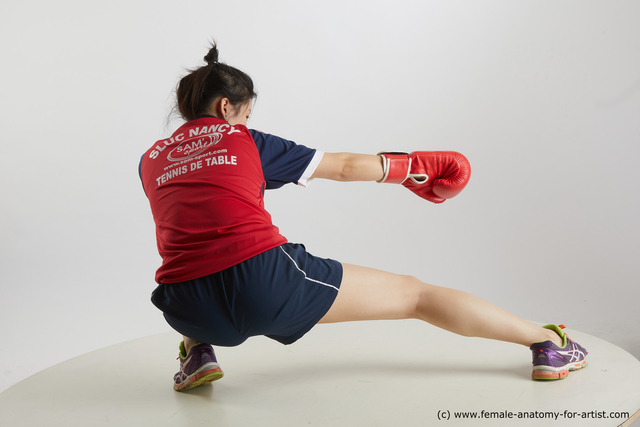 Sportswear Woman Asian Kneeling poses - ALL Average Kneeling poses - on one knee medium black Fighting Standard Photoshoot