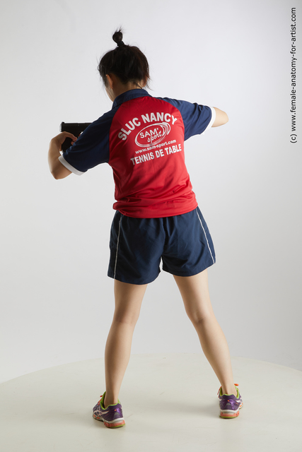 Sportswear Fighting with gun Woman Asian Standing poses - ALL Average medium black Standing poses - simple Standard Photoshoot
