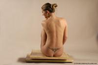 Photo Reference of lucie sitting pose 016