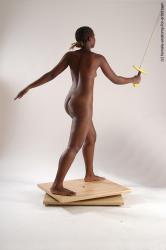 Nude Fighting with sword Woman Black Standing poses - ALL Slim dreadlocks black Standing poses - simple Pinup