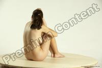 Photo Reference of elena sitting pose 07b