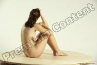 Photo Reference of elena sitting pose 08b