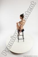 Photo Reference of evelina sitting pose 05a