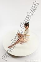 Photo Reference of evelina sitting pose 05a