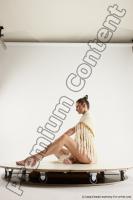 Photo Reference of evelina sitting pose 05c