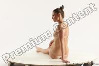 Photo Reference of evelina sitting pose 04b