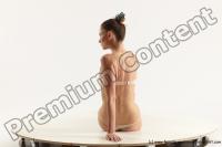 Photo Reference of evelina sitting pose 05b