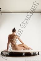 Photo Reference of evelina sitting pose 07c