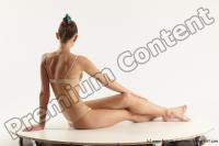 Photo Reference of evelina sitting pose 08b