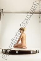 Photo Reference of lola kneeling pose 01
