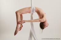 Photo Reference of aerial silk pose reference